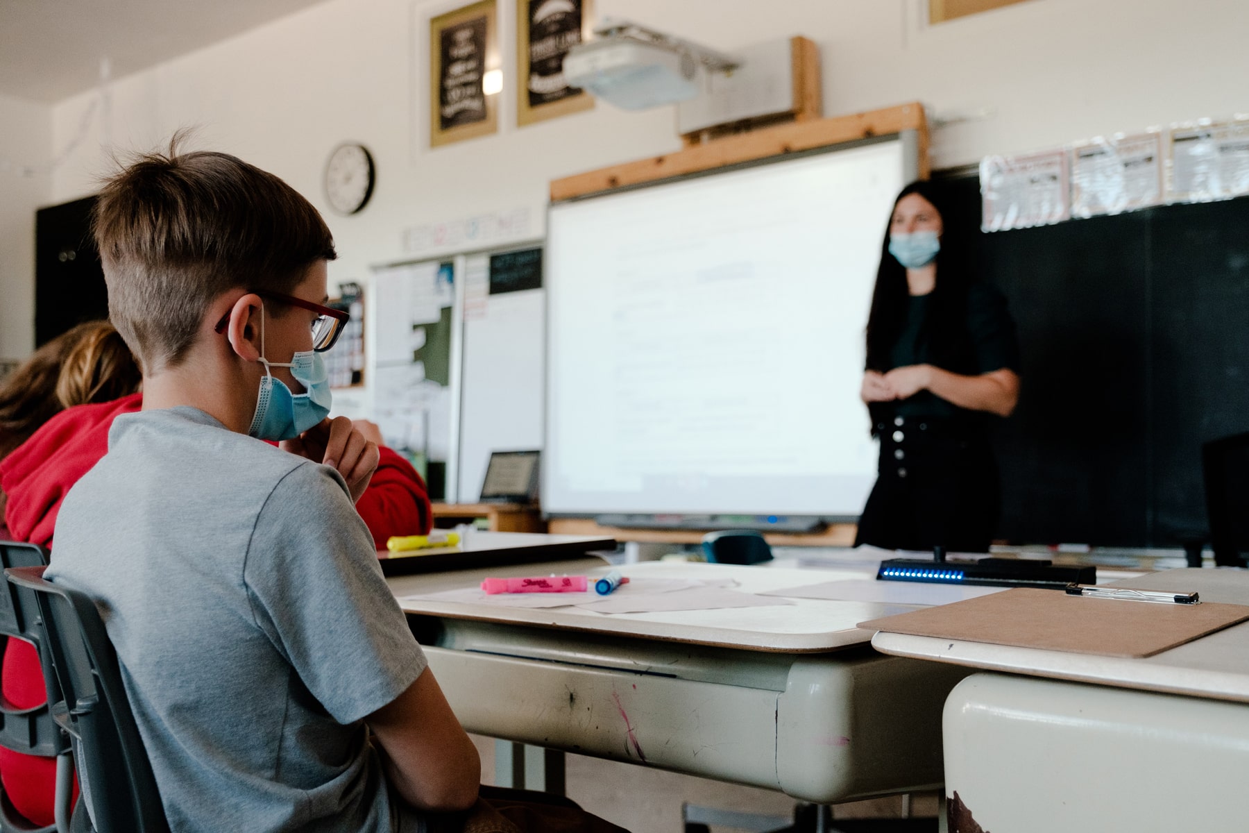 Student helped by Sequence device on his desk