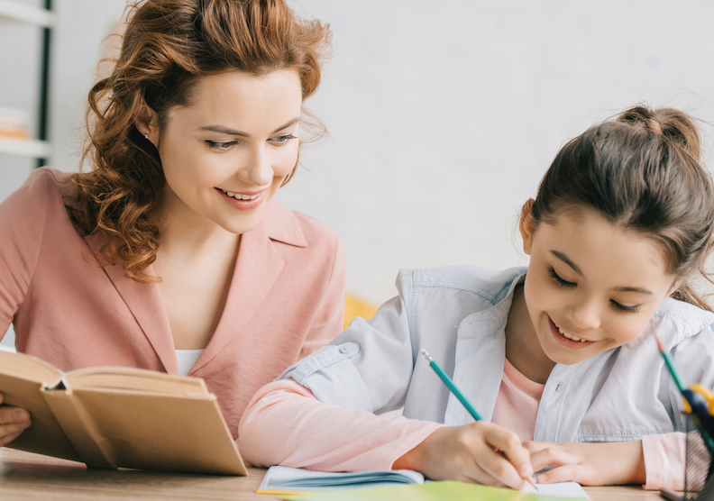 A tutor explaining a lesson to a child